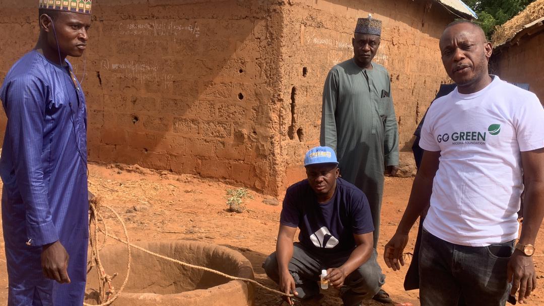 Volunteers collaborating on a Go Green Nigeria project