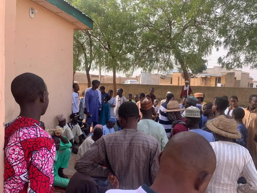Residents gathered to listen during an outreach session